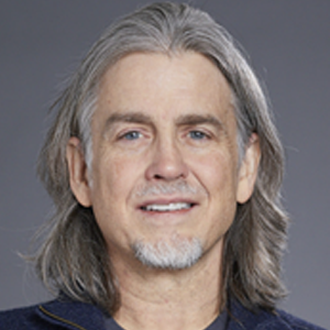 Professional headshot of John Quackenbush, Ph.D.